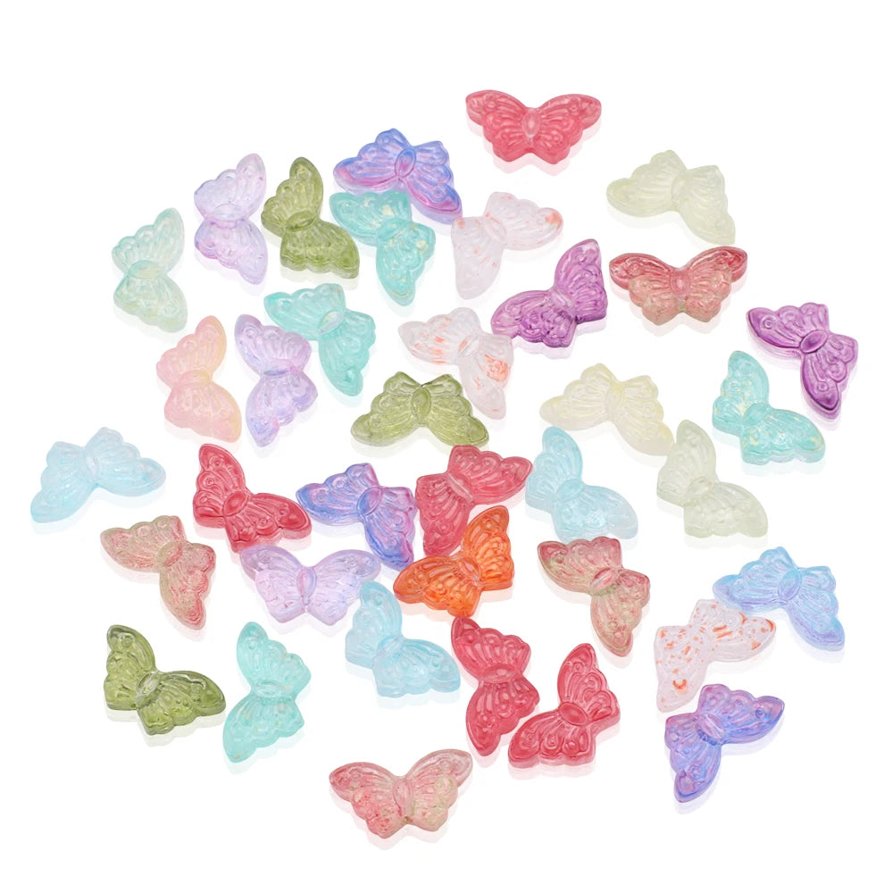 A collection of 50 glass butterfly beads in various pastel colors like pink, purple, green, and white.