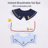 Set of three breathable Sol Bye embroidery bibs in navy blue, white, and light blue for babies