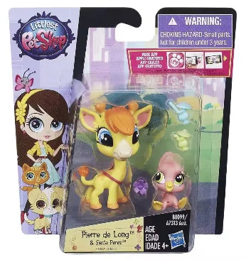 A set of three small plastic animal figures, including a lion cub and other animals, packaged in a purple box.