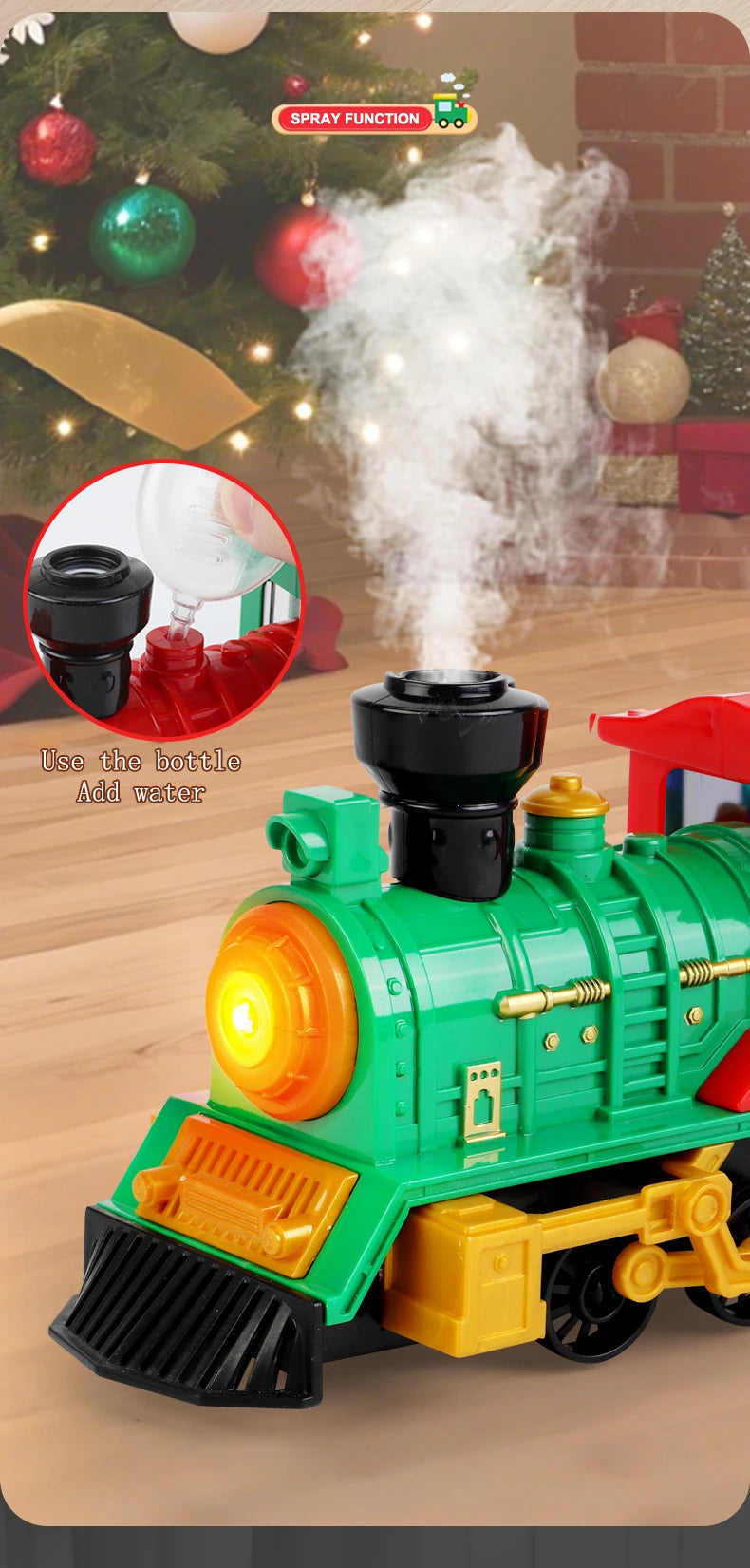 A green steam train toy with a light, demonstrating a spray function for Christmas decorations.