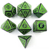 A set of polyhedral dice in green and black, including d12s, d20s, d8s, and a d6.