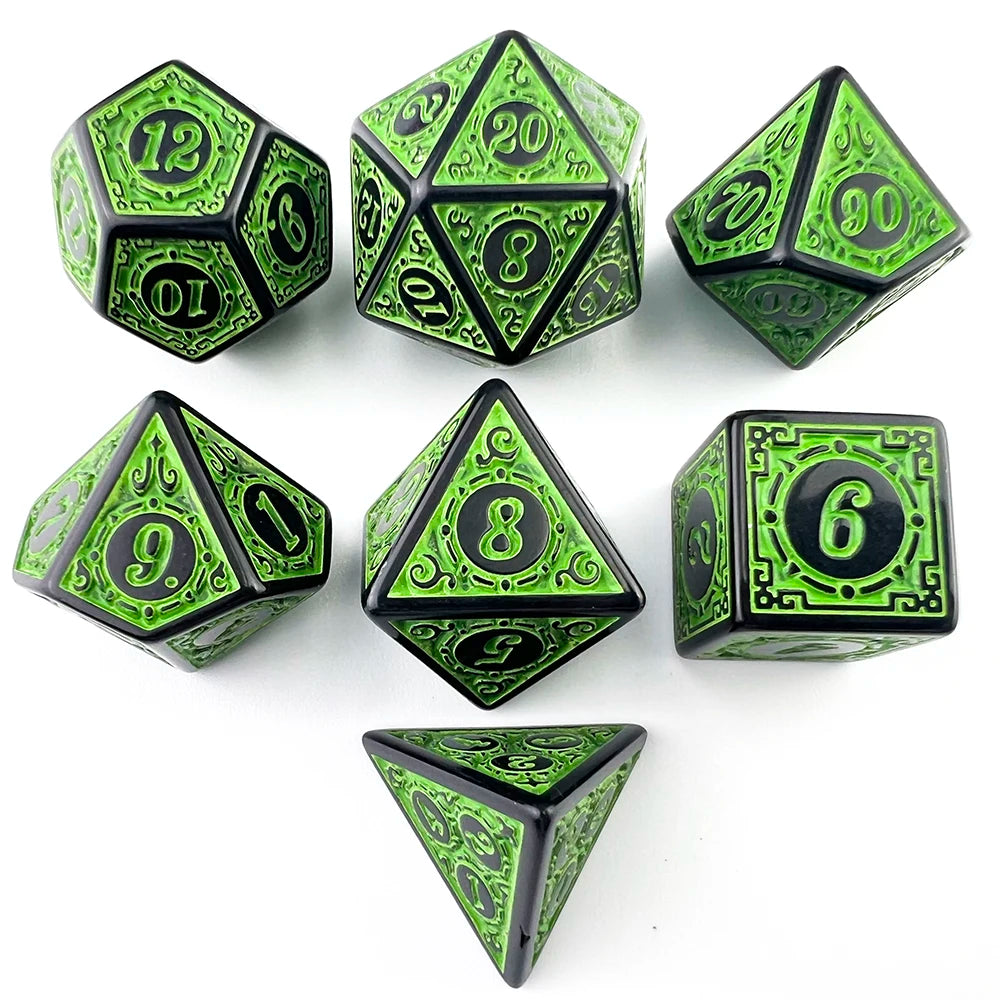 A set of polyhedral dice in green and black, including d12s, d20s, d8s, and a d6.