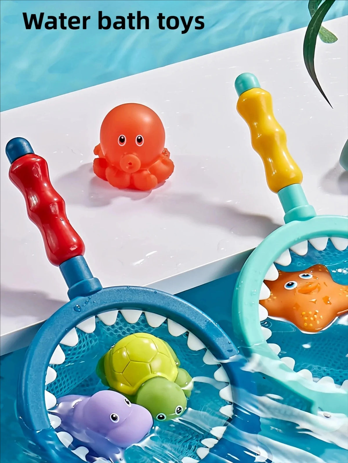 A collection of water bath toys including an orange rubber duck, a yellow squirting toy, and a purple turtle in a blue bath.
