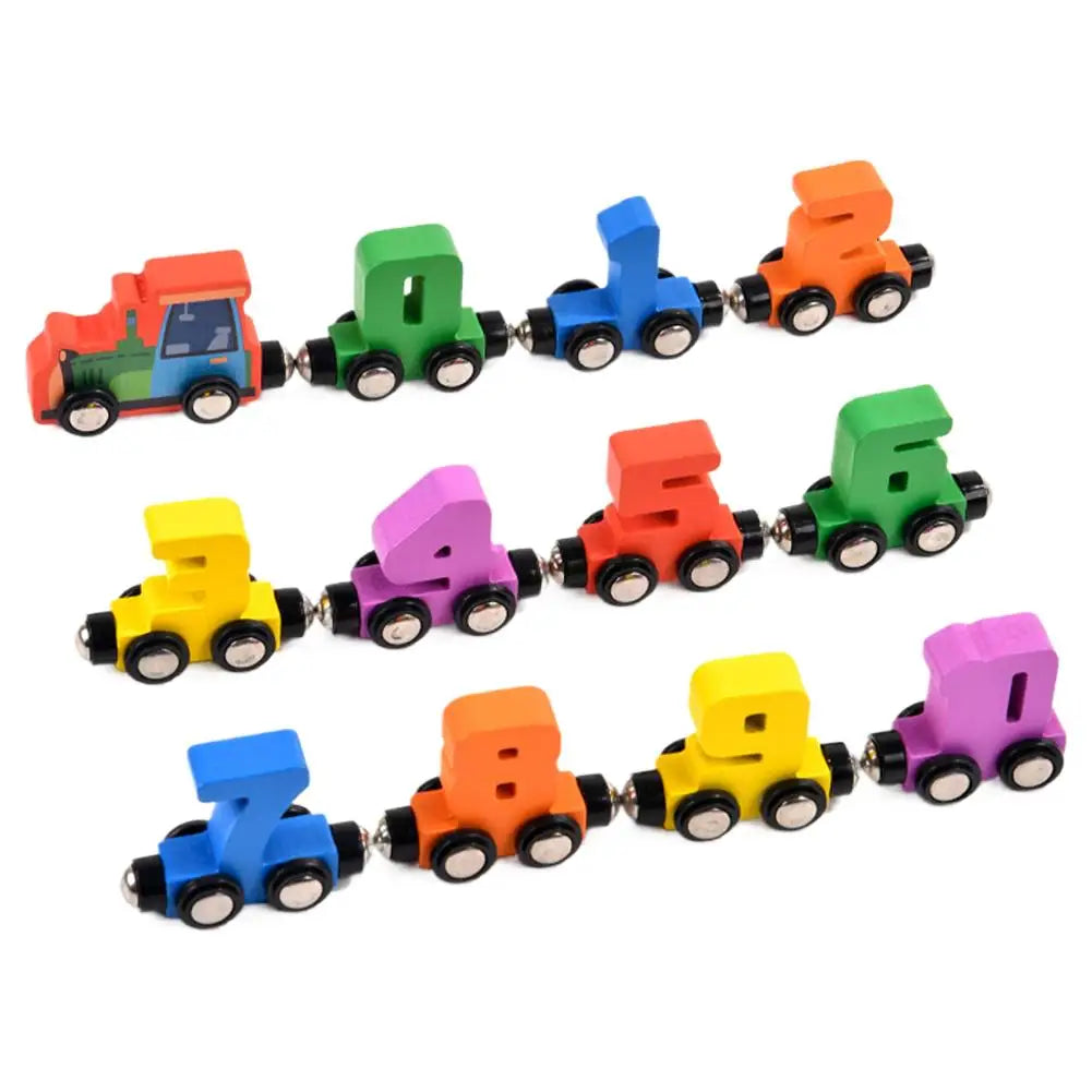 A set of wooden magnetic number train cars in various colors including red, green, blue, orange, and purple.