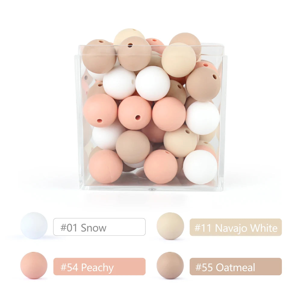 A clear container filled with various round silicone beads in shades of pink, beige, and white for DIY jewelry making.