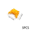 Five yellow plastic ocean animal building blocks or marine creatures.