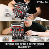 A person is assembling a detailed model of a V8 supercar engine kit with many small parts on a table.