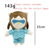 A plush doll resembling Eminem, XXXTentacion, and Frank Ocean with brown hair and light blue clothing.