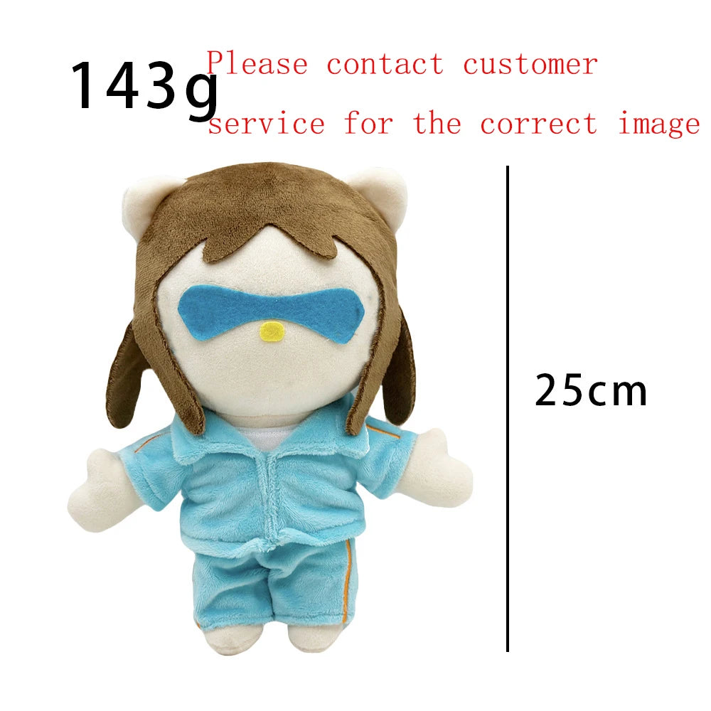 A plush doll resembling Eminem, XXXTentacion, and Frank Ocean with brown hair and light blue clothing.