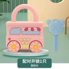 A pink toy suitcase shaped like a train with a handle and wheels, accompanied by a blue key labeled 5 for number matching.
