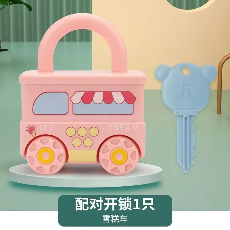 A pink toy suitcase shaped like a train with a handle and wheels, accompanied by a blue key labeled 5 for number matching.