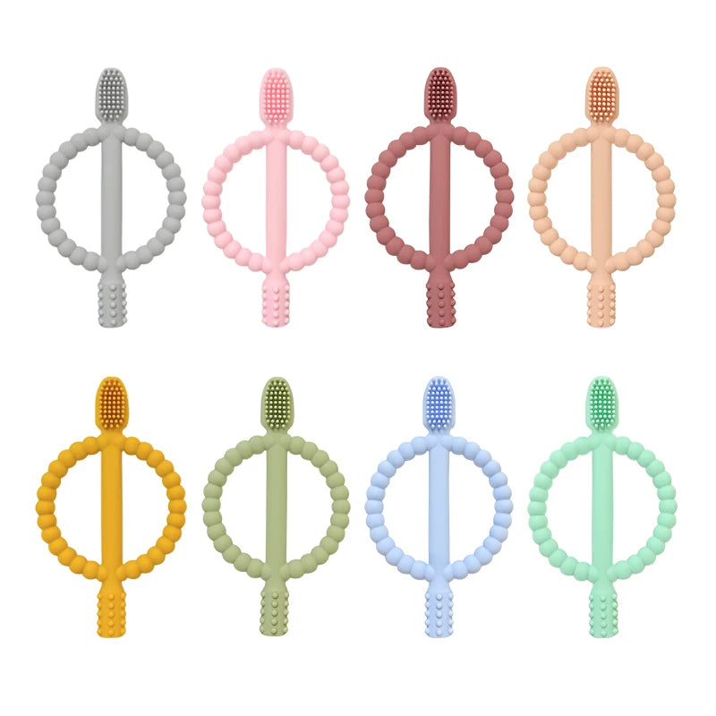 A set of five soft silicone baby teethers in various pastel colors including gray pink peach and orange