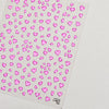 Pink heart shaped nail art stickers with a leopard print pattern on a white background
