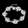 Elegant sterling silver snake chain bracelet for women featuring a tree motif design.