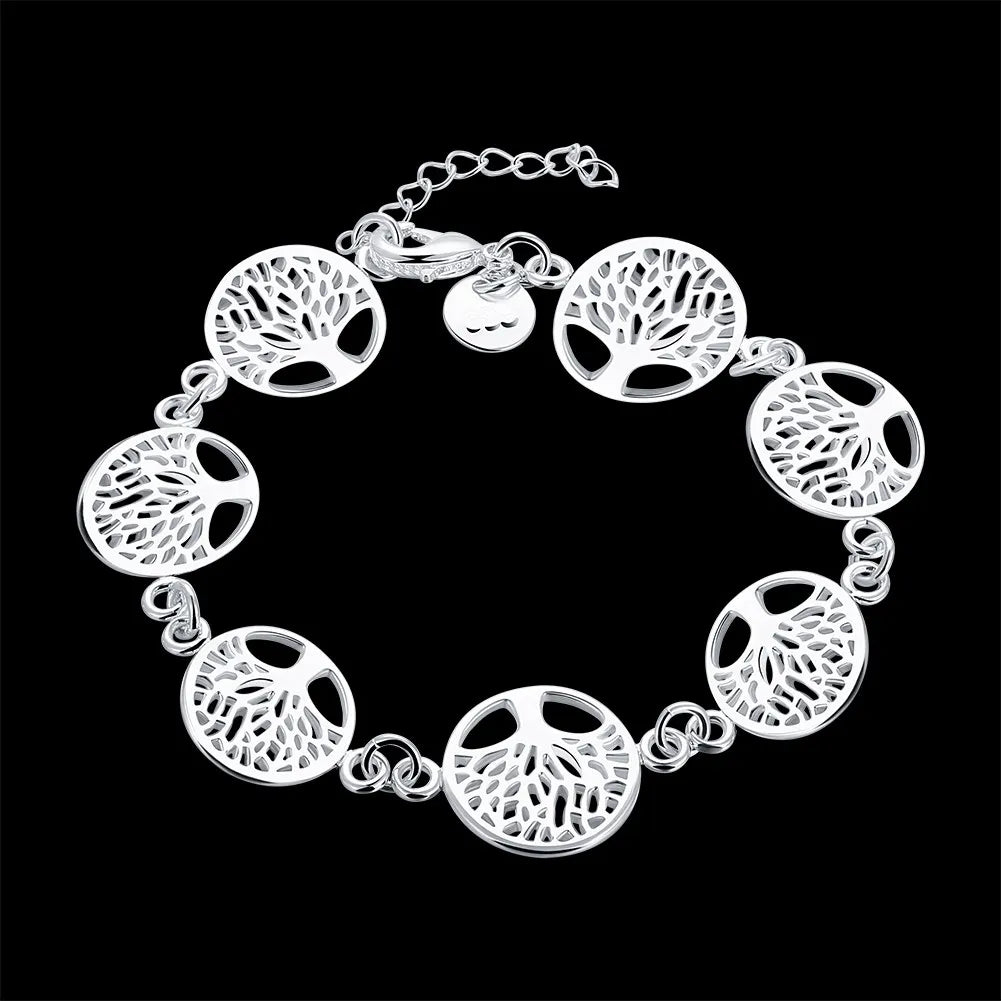 Elegant sterling silver snake chain bracelet for women featuring a tree motif design.
