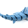 A blue remote control shark toy with light and water spray.