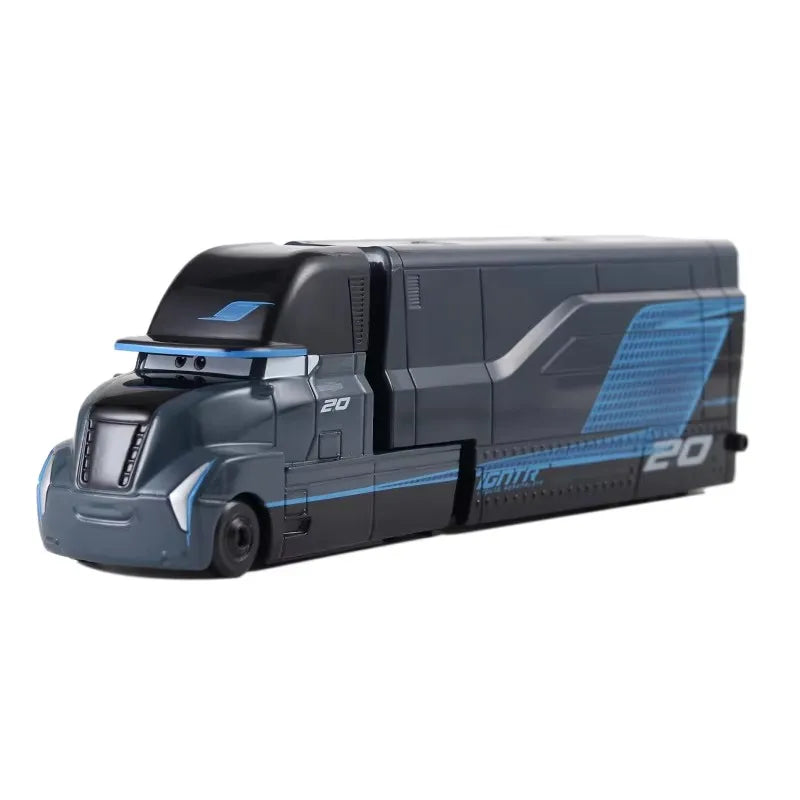 A dark gray diecast toy hauler truck model from Disney Pixar Cars 3