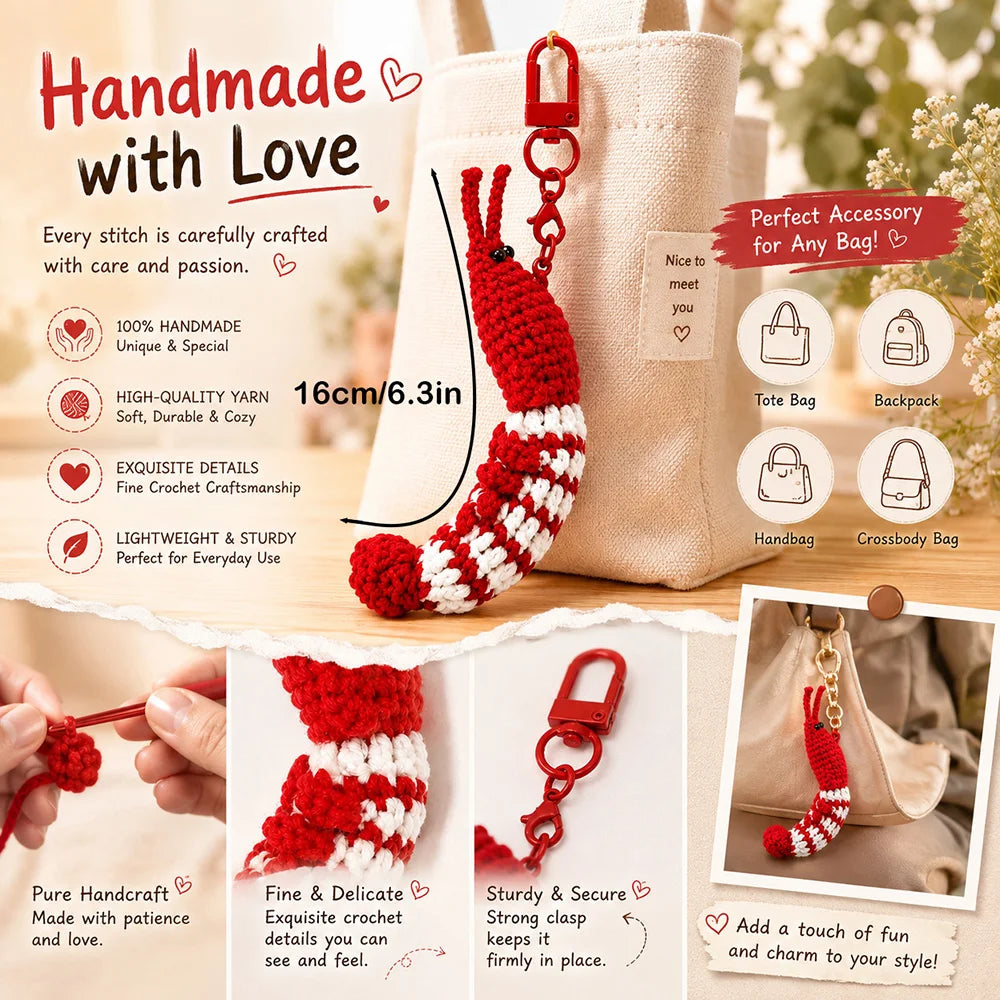 A handmade red and white crochet donkey doll accessory displayed next to a beige tote bag.