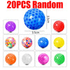 A collection of 10 colorful, random-colored soft rubber stress balls in various sizes and finishes.