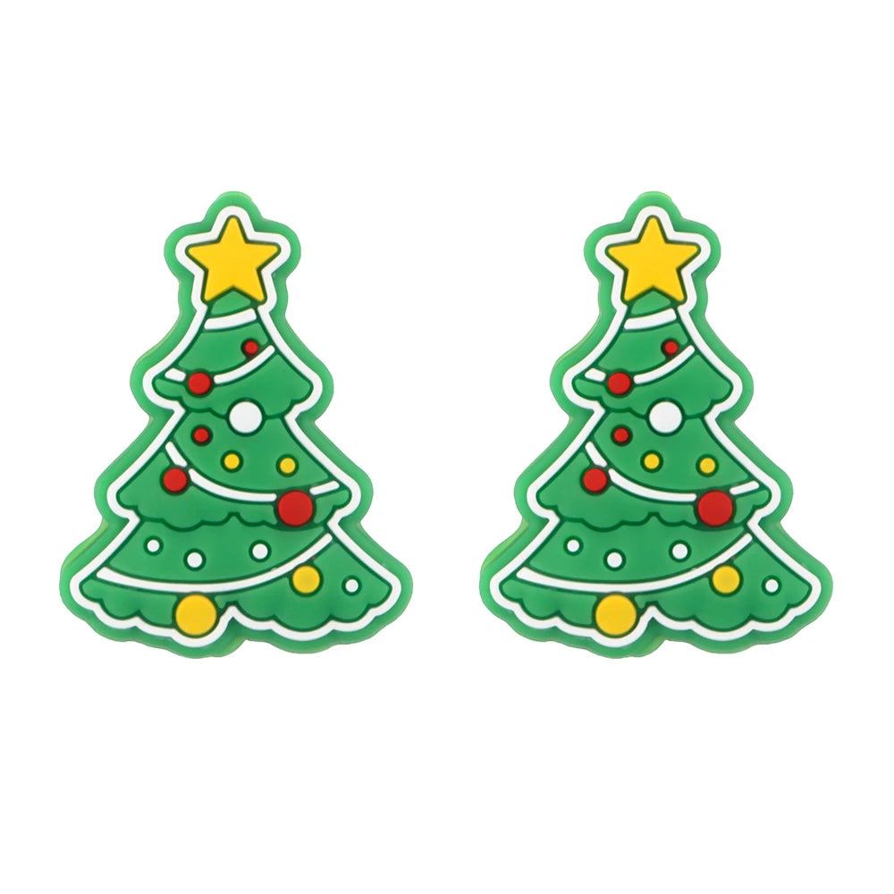 Two green Christmas tree silicone beads with yellow stars and colored ornaments for jewelry making