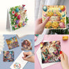 A set of DIY diamond painting birthday cards featuring flower and bird designs on colorful paper.