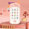 A pink baby phone toy with various buttons and a heart, set against a soft pink background.