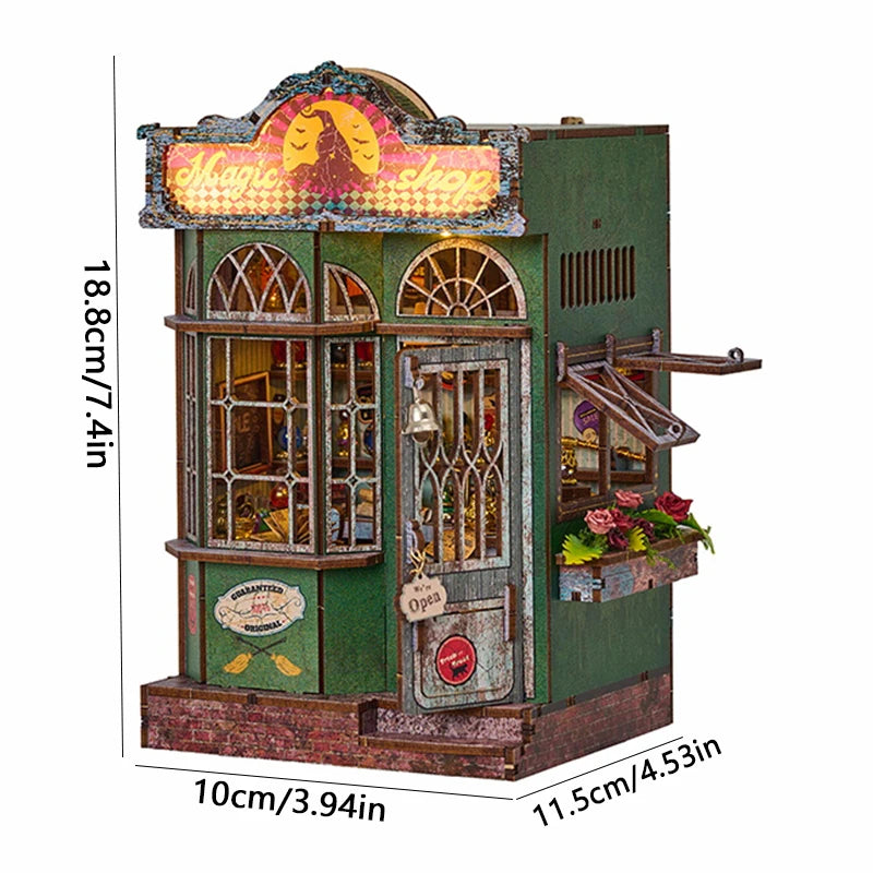 A miniature wooden dollhouse kit featuring a shop facade with large windows and a sign.