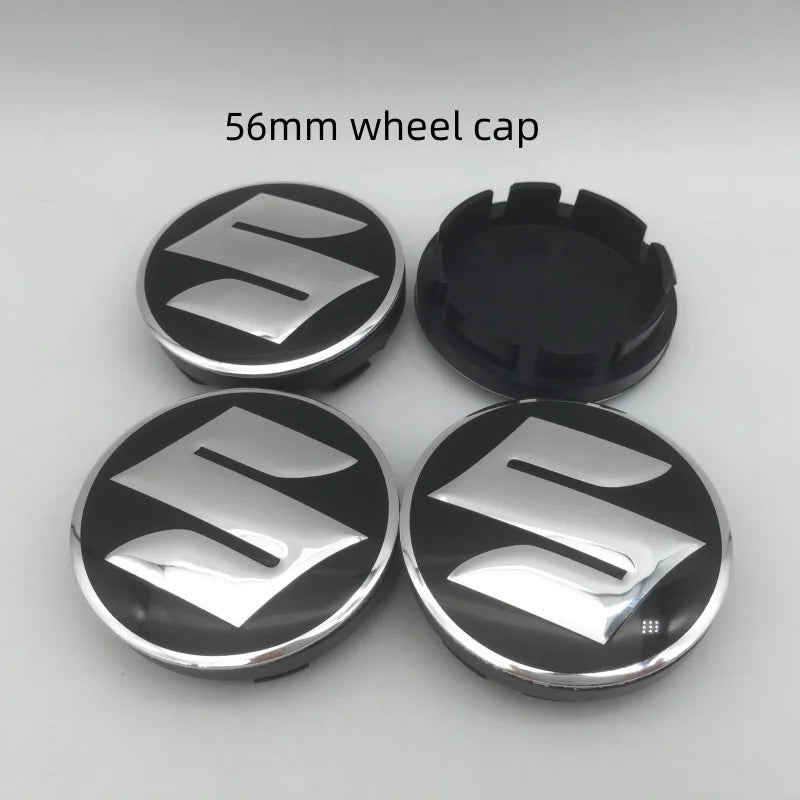 Four 56mm Suzuki wheel cap components shown, including a flat cap and a raised center cap.