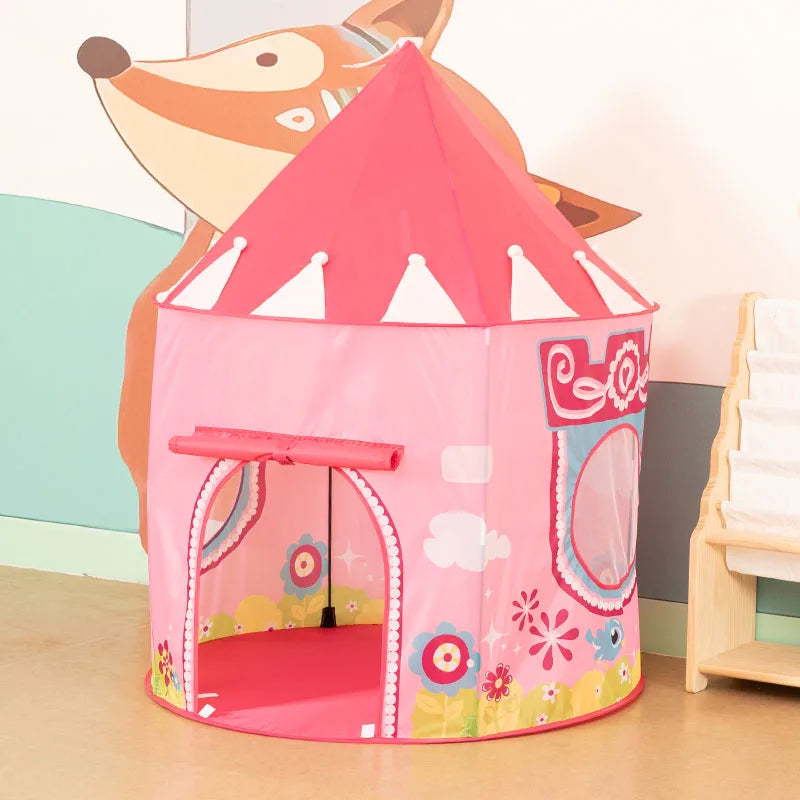 A pink rocket ship pop-up play tent with a fox head decoration sits on a light wooden floor.