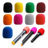A collection of colorful foam windscreen pop filters and microphone covers in various colors like black, yellow, green, pink,