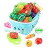 A plastic basket filled with various colorful pretend fruits like apples, watermelon slices, and oranges for a DIY cutting mu