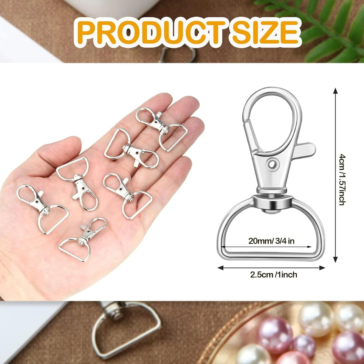A hand displays multiple silver swivel snap hooks with D-rings for crafting and keychains.