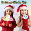 Two smiling girls holding red gift boxes and an axolotl stress relief fidget toy