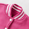 Pink knitted cardigan with white stripes on the collar and a single button closure.