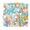 A collection of colorful sensory play sand in various pastel shades including yellow, blue, pink, and white.