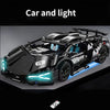 A black 1:14 scale RC sports car building kit with lights and details shown on a gray background.