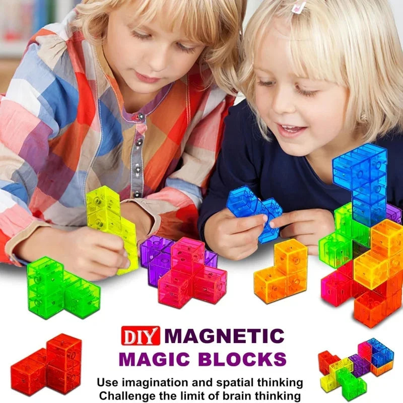 Two children are playing with colorful magnetic 3D magic blocks.