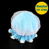 Light blue jellyfish plush toy with translucent fins and ruffled blue fabric