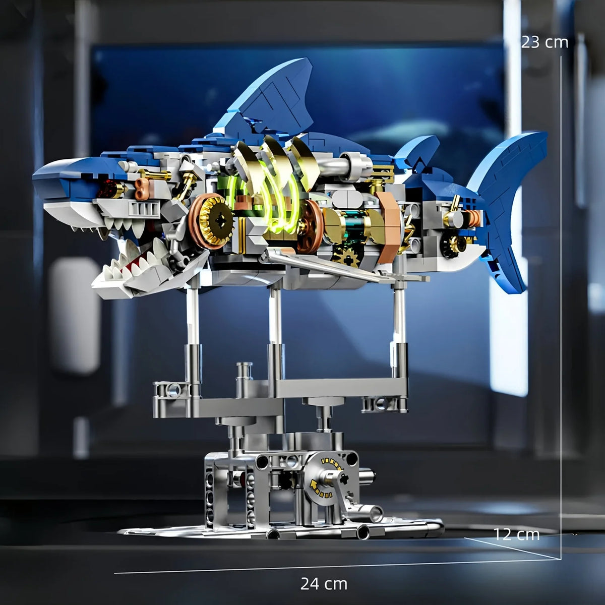 A detailed mechanical model of a dragonfly, featuring blue and silver components, displayed on a stand.