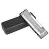A harmonica with a stainless steel cover and numbered holes is shown on a black case.
