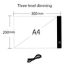 A rectangular LED drawing copy pad with a black border and a power cord.