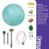 A collection of minerals and tools including quartz, agate, jasper, and various digging implements for a planet gem kit.