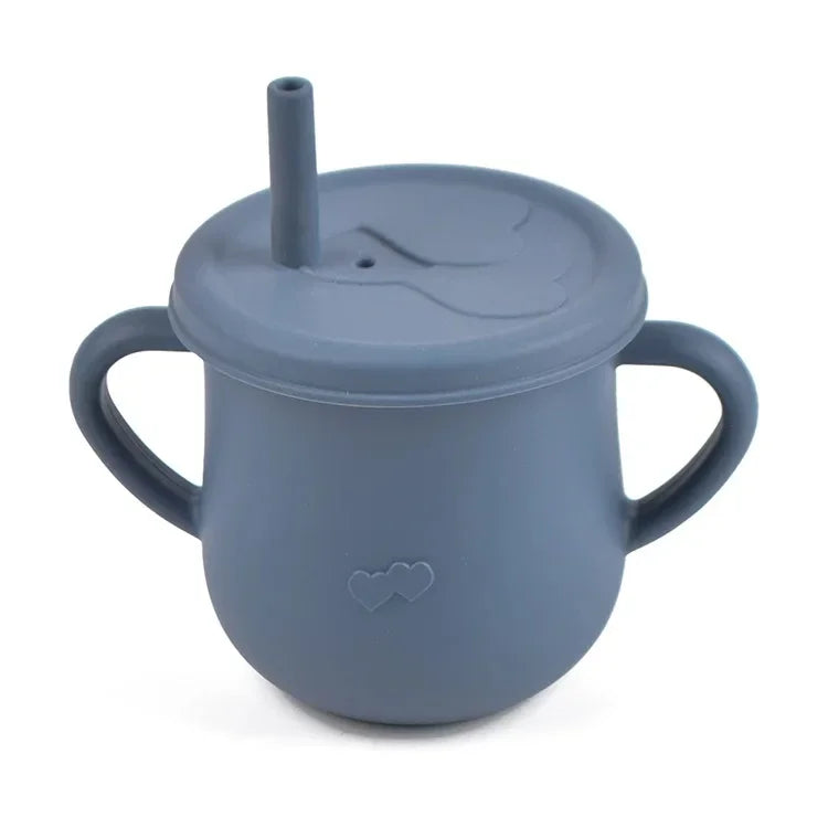 A gray BPA-free silicone snack cup with a lid and handle for babies and toddlers.