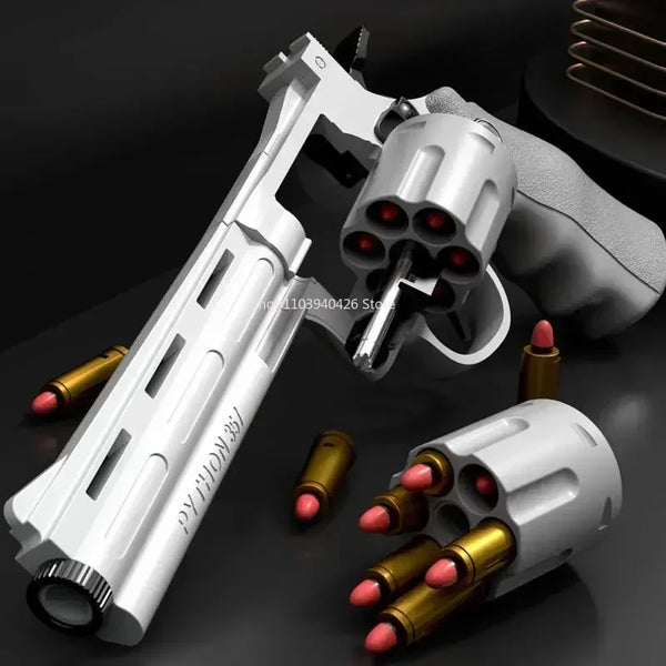 A white continuous fire dart toy pistol gun is shown with a magazine and several darts.