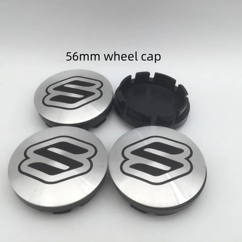 Two 56mm wheel caps for Suzuki wheel hubs, shown in silver and black.