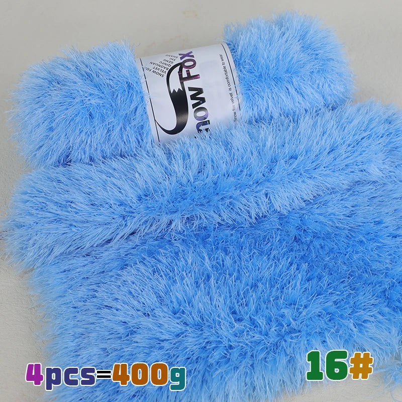 A bright blue faux fur yarn product featuring a label and a swatch of the fluffy material.