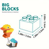 A set of yellow and orange wooden building blocks shown with a box and some loose pieces.