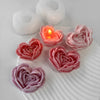 Pink silicone heart shaped flower mold for crafting candles, soap, and desserts