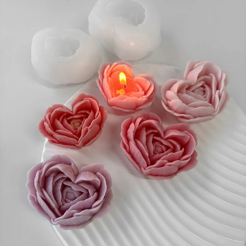 Pink silicone heart shaped flower mold for crafting candles, soap, and desserts