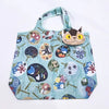 A colorful fabric tote bag featuring various animal illustrations and patterns.